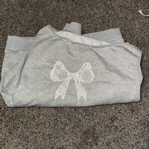 Gray Sweatshirt with White Bow Design